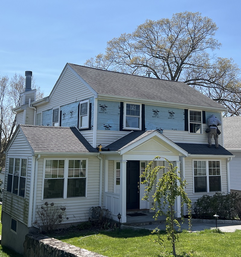 New construction installation included removal and reinstallation of siding 